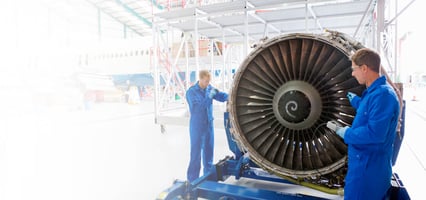 Man working on Aeroplane engine